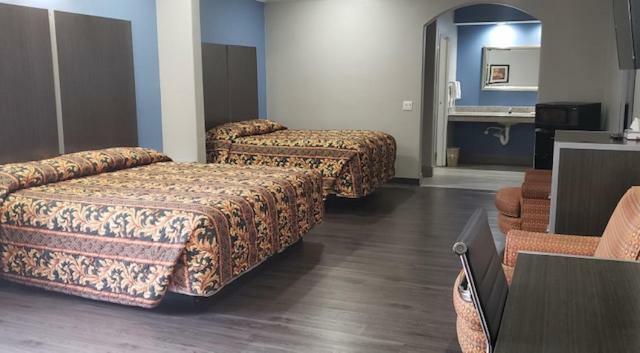 Camelot Inn & Suites Хьюстон Экстерьер фото