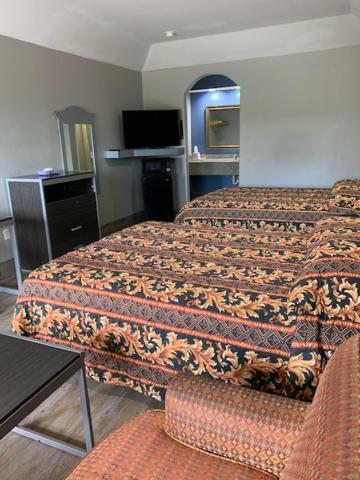 Camelot Inn & Suites Хьюстон Экстерьер фото